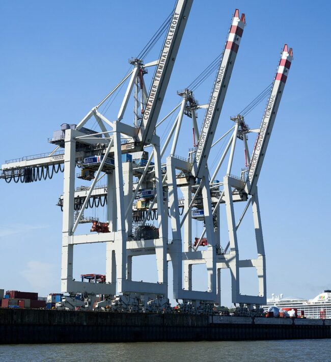 An image of large cranes used in harbours