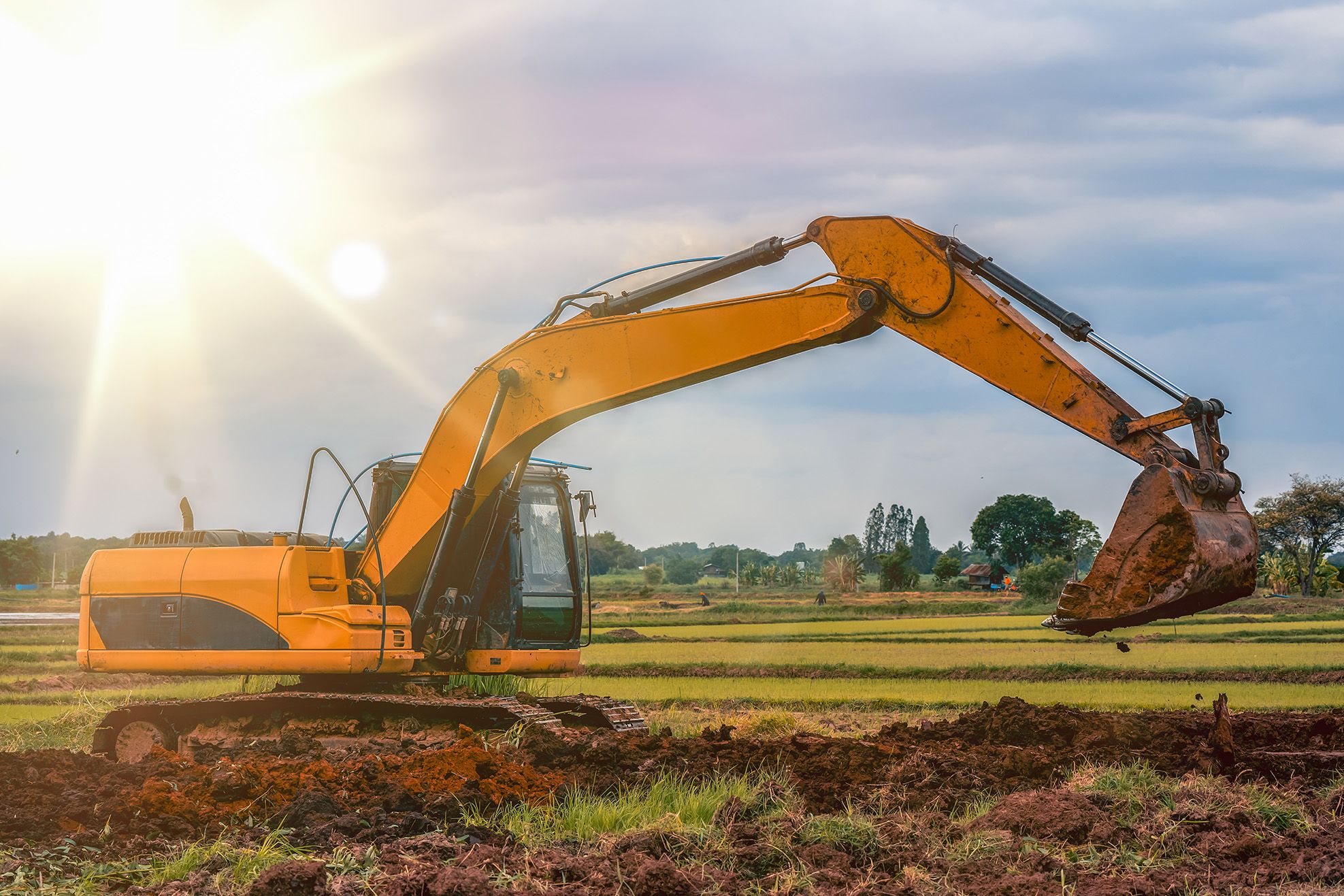 An image of a digger excavation a field