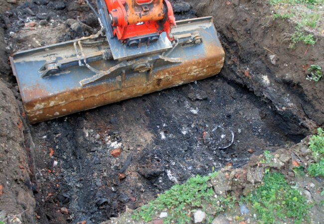 An image of soil excavation project by a digger