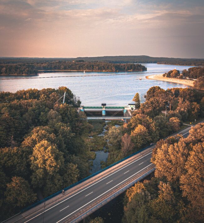 An image of road by a dam